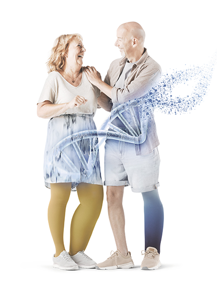 Deux personnes qui se sourient. Au premier plan, une représentation graphique de l'ADN Deux personnes qui se sourient. Au premier plan, une représentation graphique de l'ADN